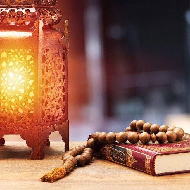 islamic holy book quran with rosary beads ornamental arabic lantern e1699787380113